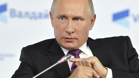 104819268-RTS1H7GU-putin.530x298